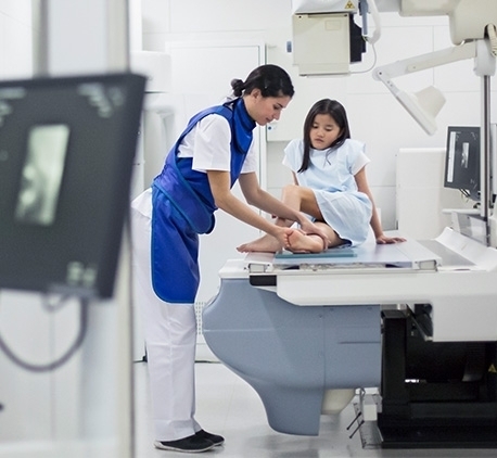 doctor prepping a young girl for a procedure